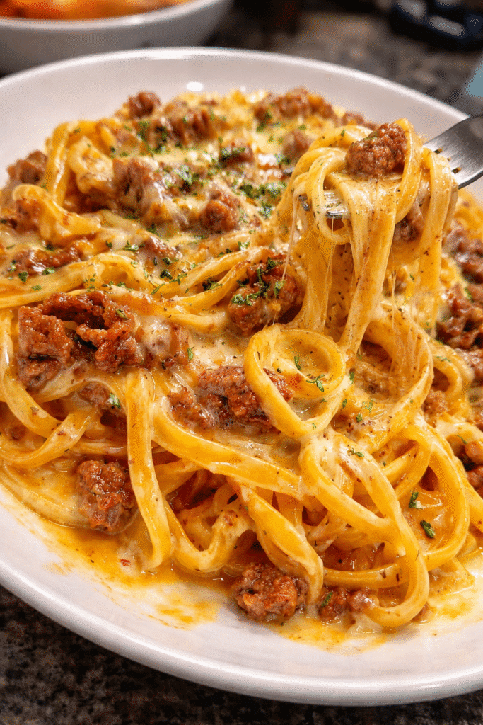 Garlic Butter Beef Linguine with Creamy Cheddar Parmesan Cream Sauce